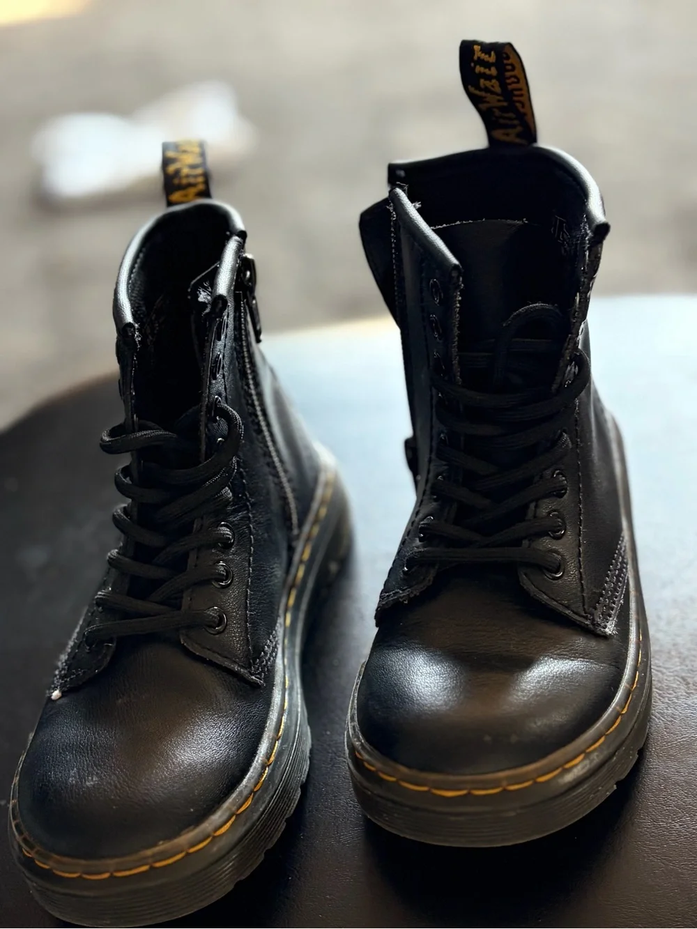 Dr. Martens Kids Black Leather Lace-Up Boots with Yellow Stitching
